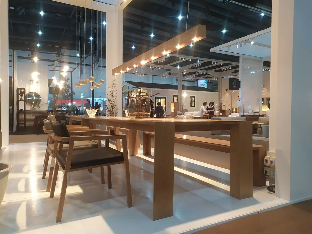 Wooden dining tables, chairs and pendant lights at Baanlaesuan Fair Select 2022 in BITEC Bangkok