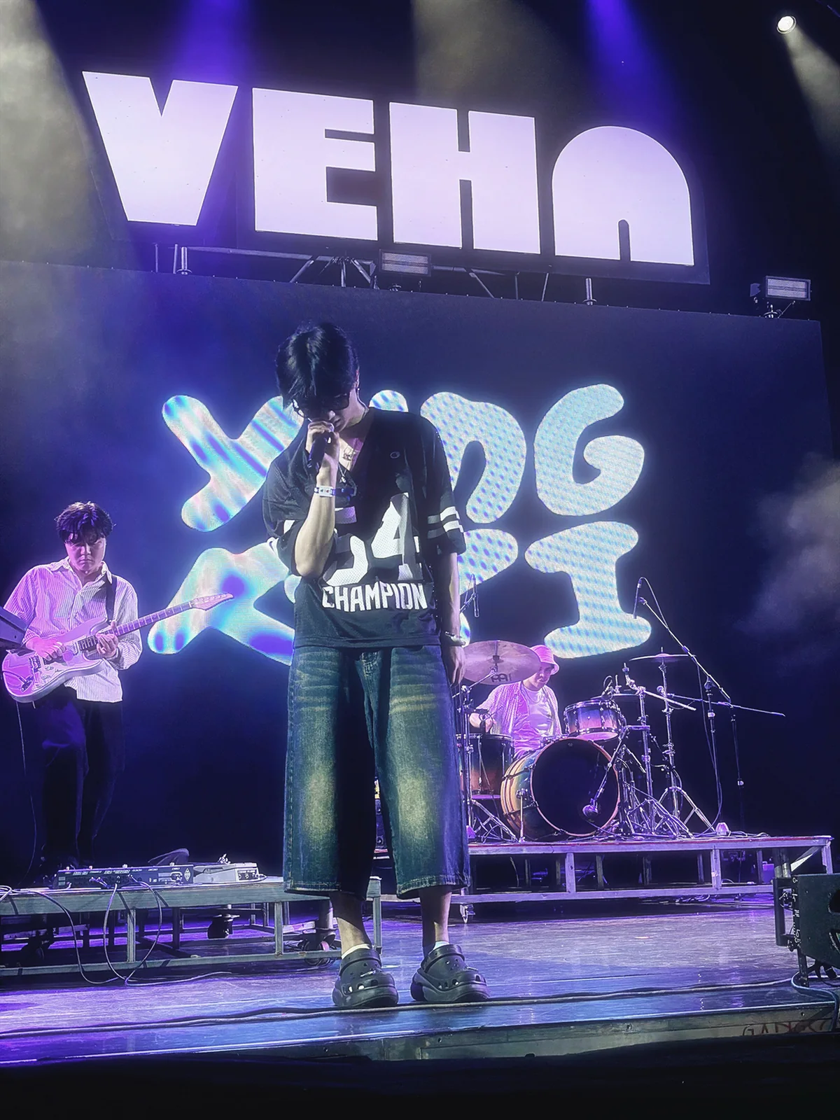 Yung kai singing on the VEHA stage at Pelupo Music Festival in Thailand