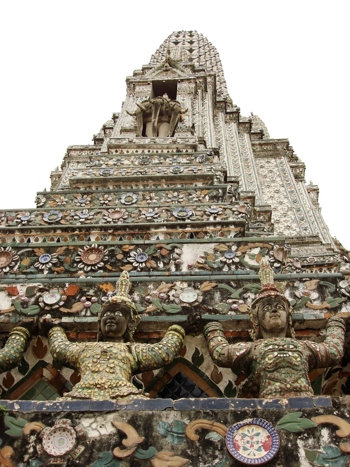 Porcelain mosaic decoration and sculpted supporting figures on Wat Arun’s central prang
